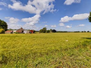 View over open countryside- click for photo gallery